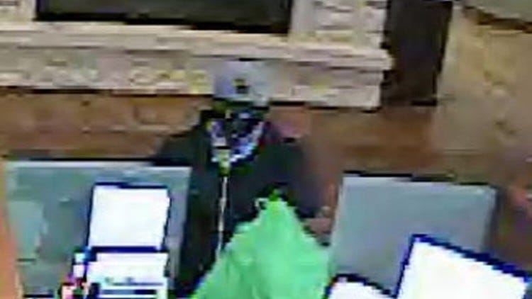 FYI: Police looking for suspect in bank robbery