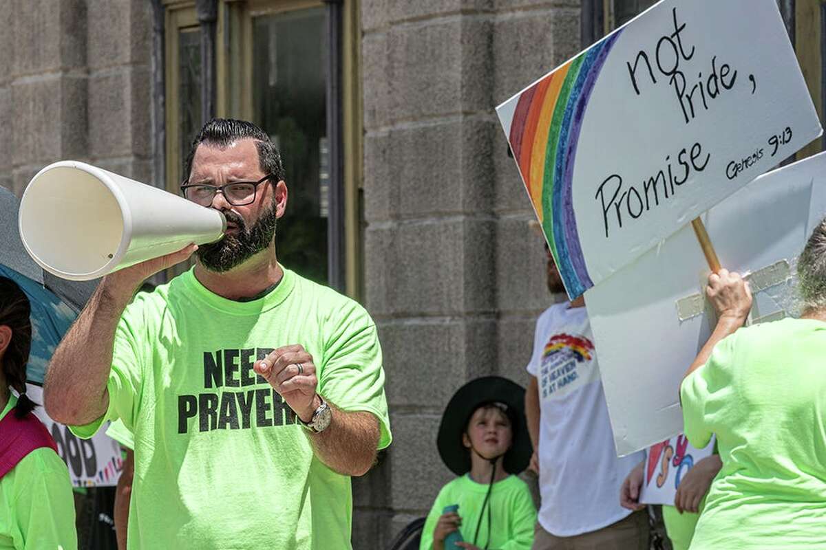 Pastor Joel Webbon, Senior Pastor at Hutto's Covenant Bible Church, joined others holding a peaceful demonstration along 2nd Street during the Taylor Pride Festival, held on Saturday, June 26, 2021.
