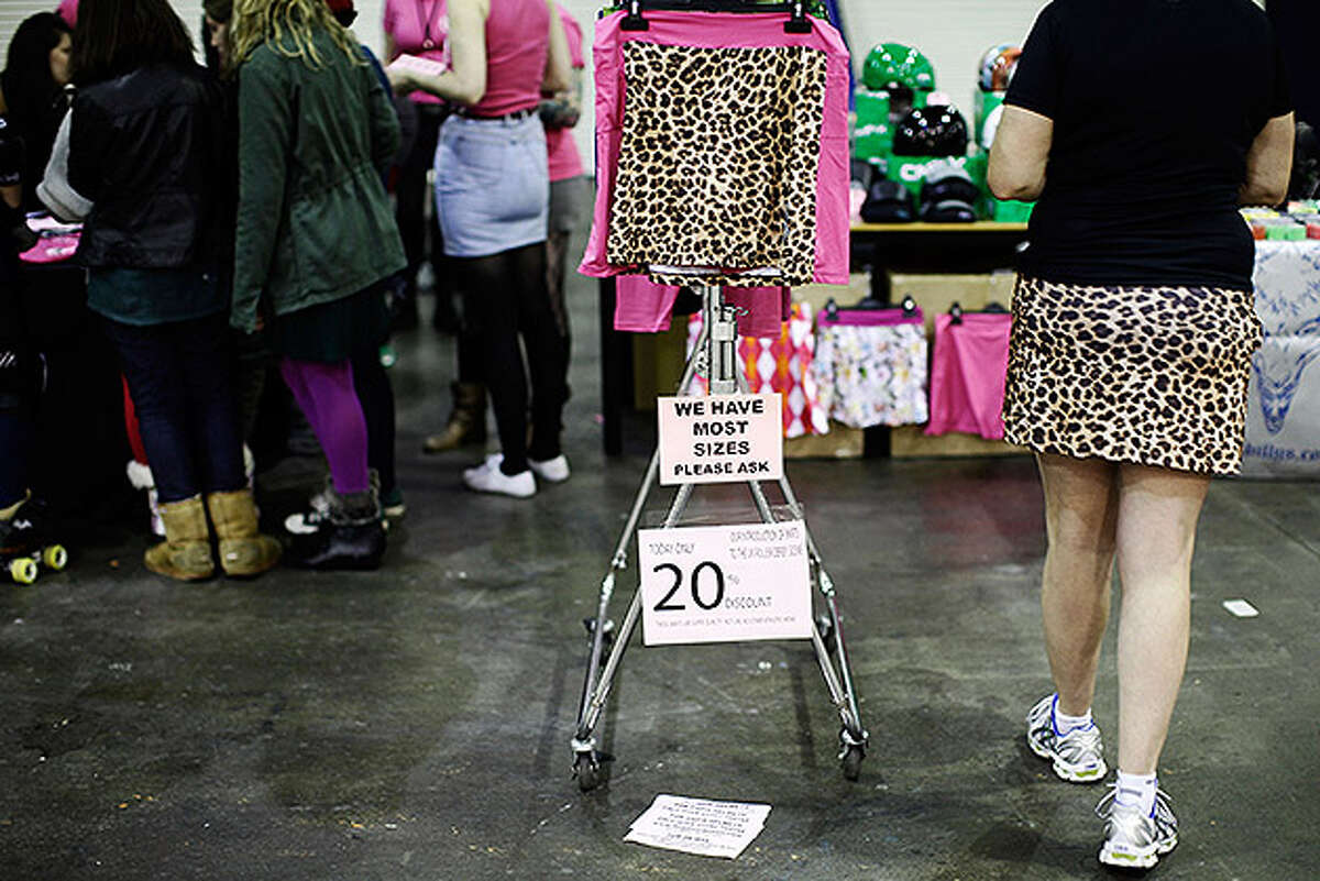 LONDON, ENGLAND - NOVEMBER 13: Stalls sell Rollergirls merchandise and complimentary fashion items at the London Rollergirls Roller Derby event at London Earls Court Olympia on November 13, 2010 in London, England. The contact sport of Roller Derby involves two teams of four defensive players and one jammer, whose role it is to pass through the pack to count a score. (Photo by Matthew Lloyd/Getty Images)