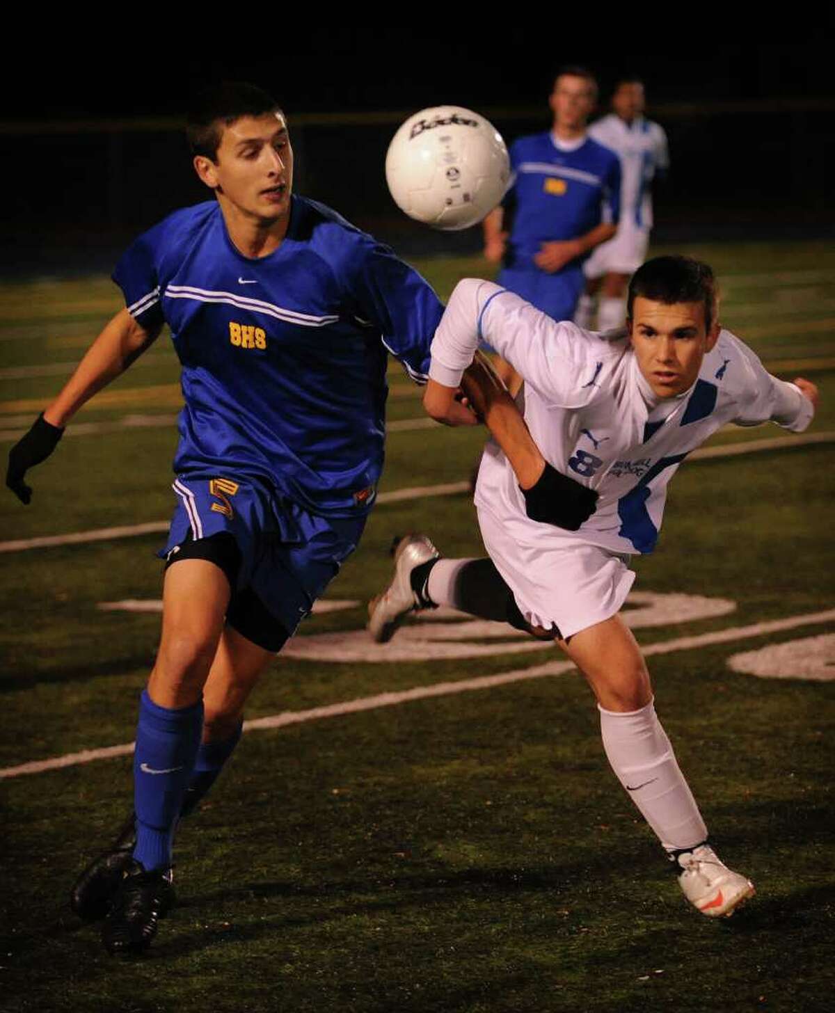 Brookfield's Austin Foulds, left, fights for control of the ball with Bunnell's James Gillespie during their Class L boys state tournament game at Bunnell High School in Stratford on Monday, November 15, 2010. Bunnell won the game on penalty kicks 5-3.