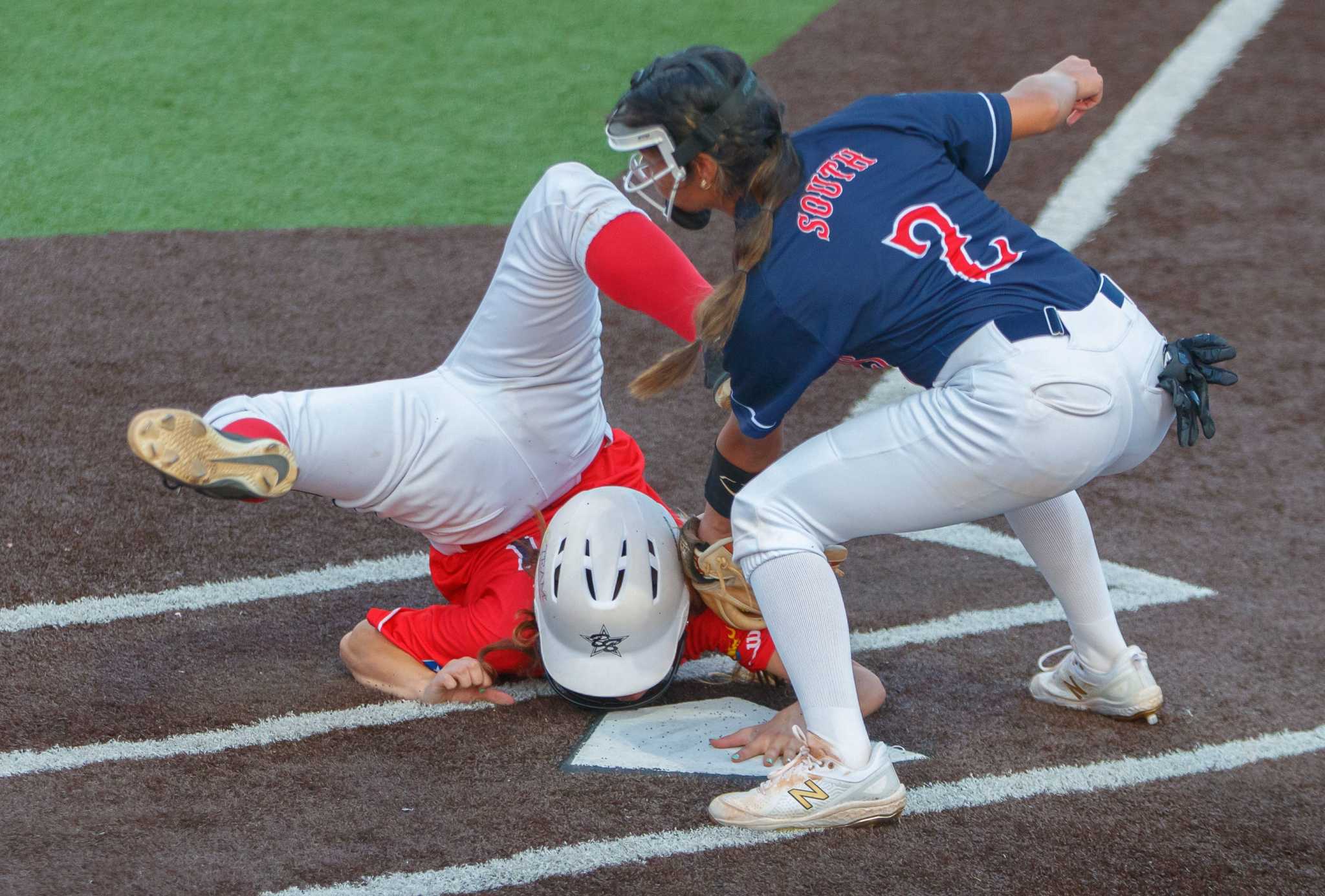 All-stars flash gloves at annual Austin-area softball game