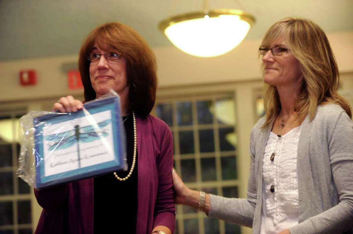 Leigh Barbour, of Pittsford, Vt., left, and her sister Paige Davis, of Greenwich, admired the plaque that will hang in "Kathy's Corner" in honor of Kathleen Krasniewicz, on Tuesday, Nov. 16, 2010. The sisters were friends with Kathleen Krasniewicz.