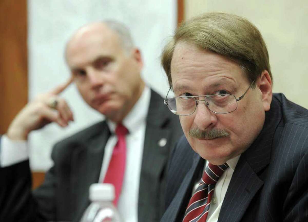 John Kline, left, chairman of the Main Street Renaissance Task Force, listens to Danbury planning director Dennis Elpern address a meeting of the task force at City Hall Tuesday afternoon, Nov. 16, 2010.