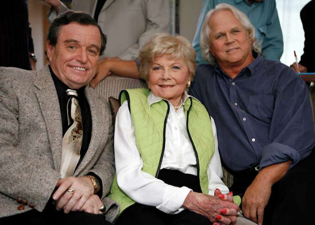 FILE - In this Sept. 27, 2007 file photo, Jerry Mathers, Barbara Billingsley, and Tony Dow, cast of "Leave It To Beaver", pose for a photo as they are reunited in Santa Monica, Calif., to celebrate the 50th anniversary of the show. Billingsley, who gained the title supermom for her gentle portrayal of June Cleaver, the warm, supportive mother of a pair of precocious boys in "Leave it to Beaver," has died Saturday, Oct. 16, 2010. She was 94. (AP Photo/Damian Dovarganes, File)