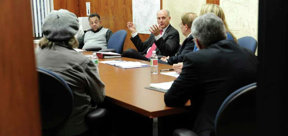 John Kline, center, chairman of Danbury's Main Street Renaissance Task Force, addresses a meeting of the group Tuesday, Nov. 16, 2010.