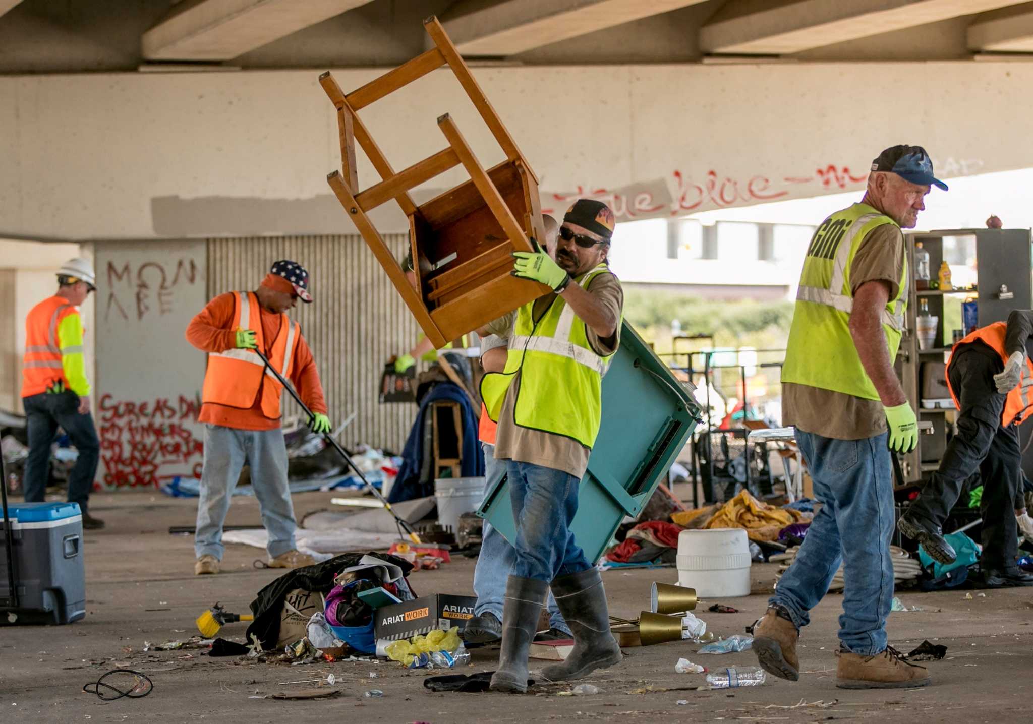 Homeless displaced as city, state crews clean up