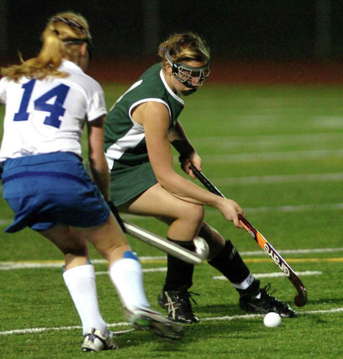 New Milford competes with Glastonbury during the field hockey game at Watertown High School Nov. 16, 2010.