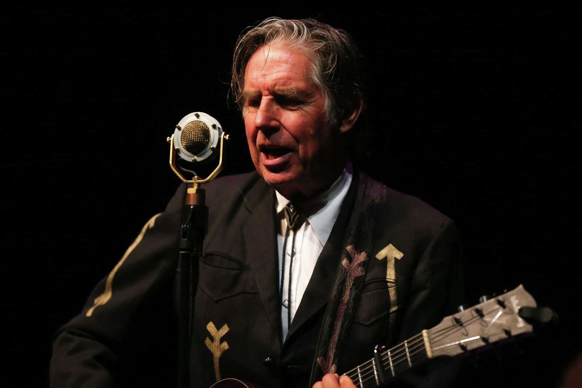 John Doe of X, now in Austin, talks 'Fables in a Foreign