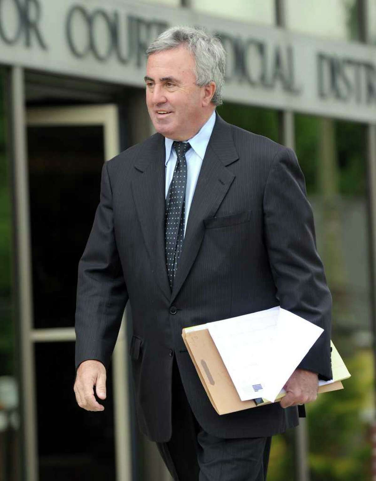 Michael “Mickey” Sherman, a Greenwich-based criminal defense lawyer leaves Danbury Superior Courtin on June 11, 2010. Sherman faces up to two years in prison as a result of his guilty pleas last summer to two misdemeanor charges of failing to pay $420,710 in owed income taxes for the years 2001 and 2002. He already repaid the taxes owed.