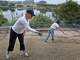 Volunteer Liz Wommack, left, and Susan Rankin, director of the Trail Foundation, background, plant wildflower seeds on the hillside of Vista Pointe on Lady Bird Lake.