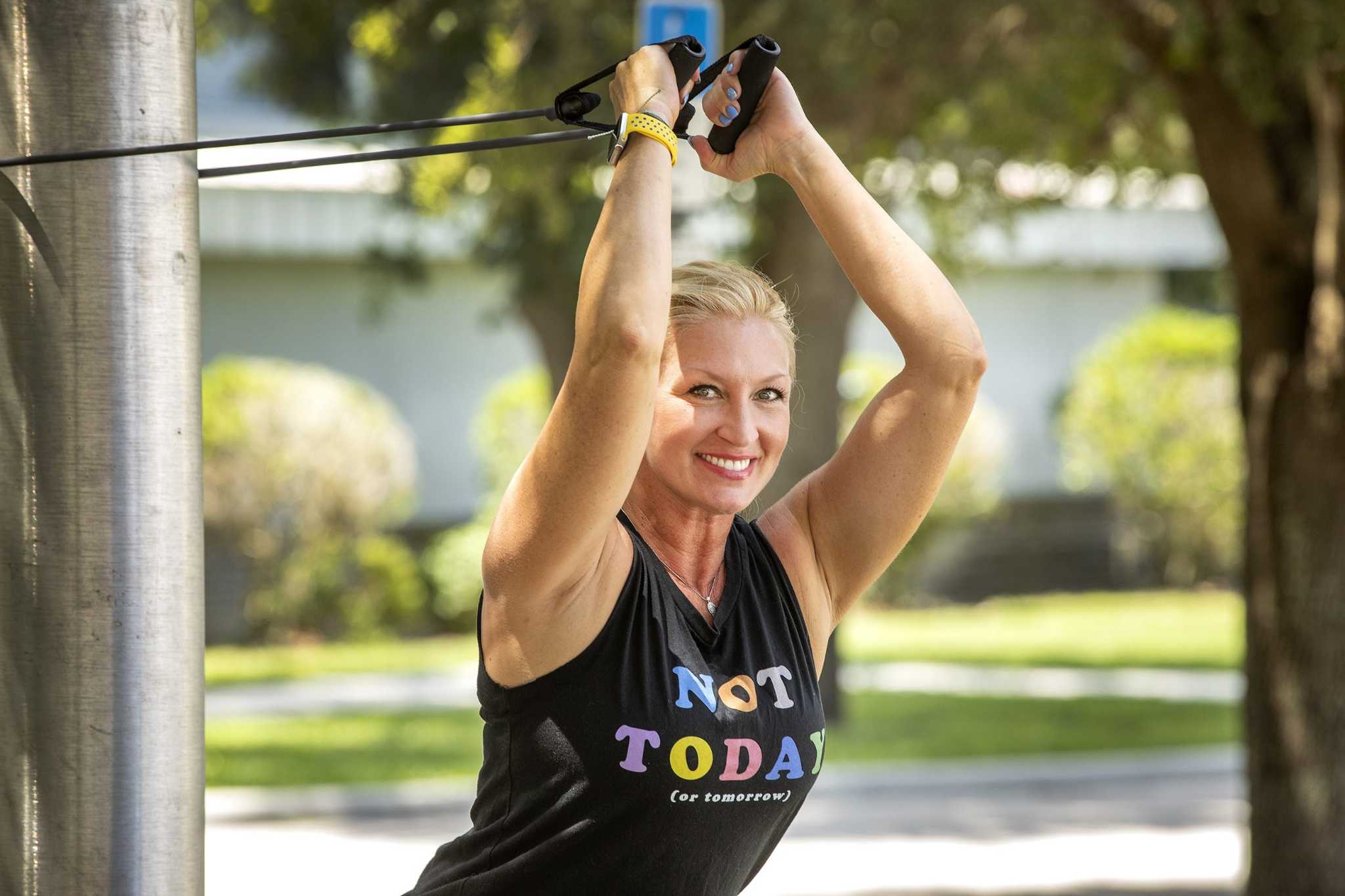 Today’s Workout: Try a triceps overhead extension with band
