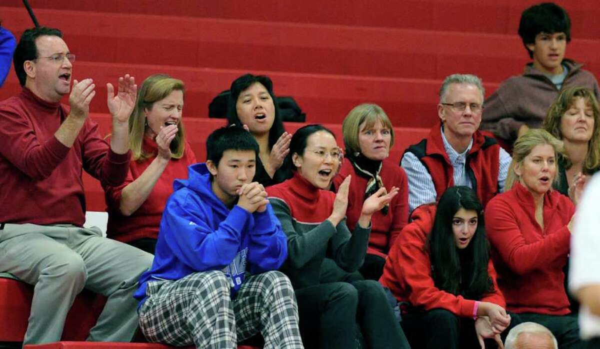 The GHS cheering section during the CIAC Class LL girls volleyball state semi-final between Greenwich High School vs. Cheshire High School at Fairfield-Warde High School, Fairfield, CT, Thursday, Nov. 18, 2010. Greenwich advanced to the finals over Cheshire, winning the semi-final 3-0.