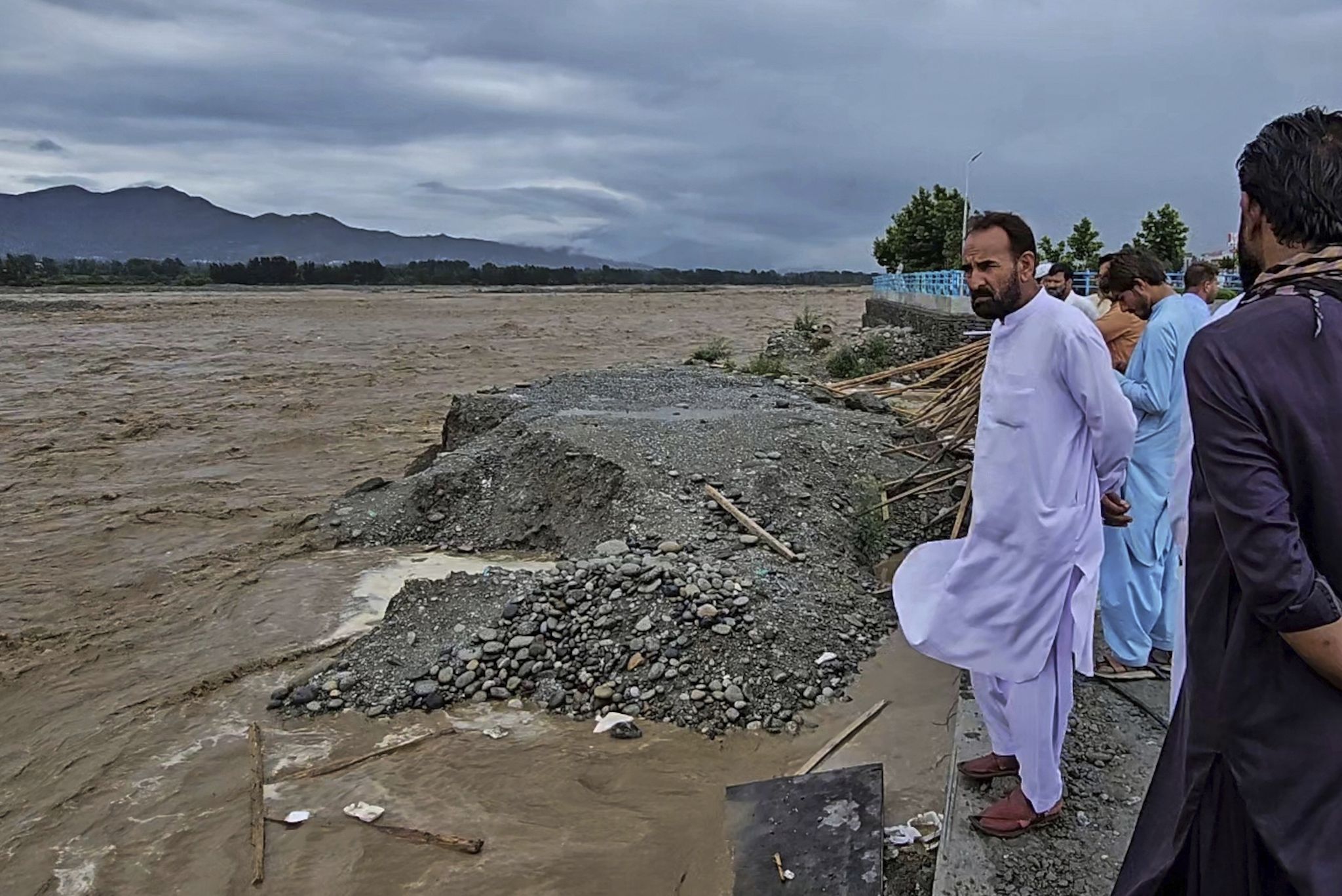 A week of heavy rains and floods across Pakistan kills 46 people including 13 family members
