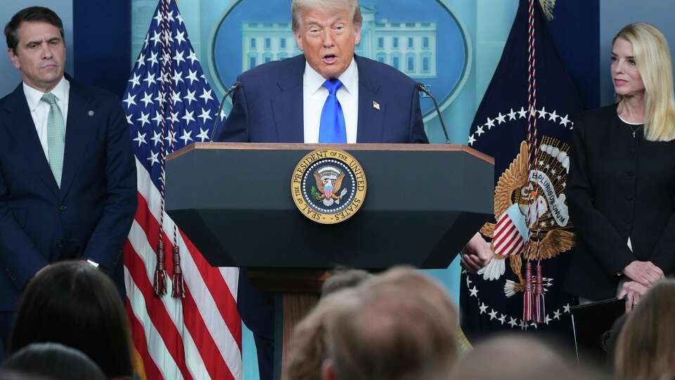 President Donald Trump speaks to the media as Attorney General Pam Bondi, right, and Deputy Attorney General Todd Blance, left, listen, Friday, June 27, 2025, in the briefing room of the White House in Washington.