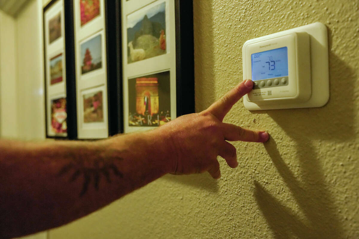 Ed Newby, owner of All Star A/C and Heating, fields calls during a heat wave on Monday, June 26, 2023 in Houston.