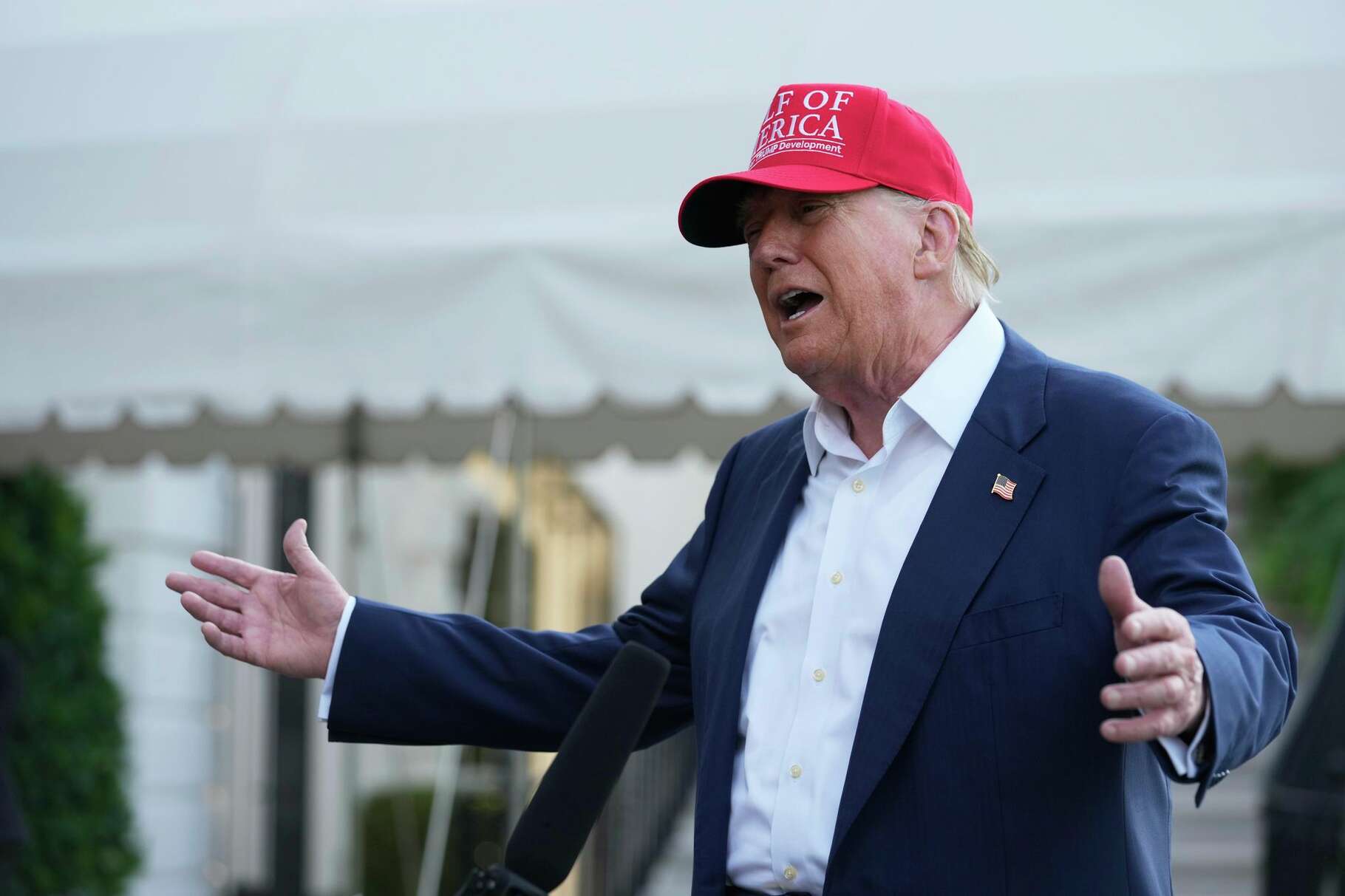 President Donald Trump speaks to the media before walking across the South Lawn of the White House to board Marine One en route to Joint Base Andrews, Md., and on to Florida, Tuesday, July 1, 2025, in Washington.