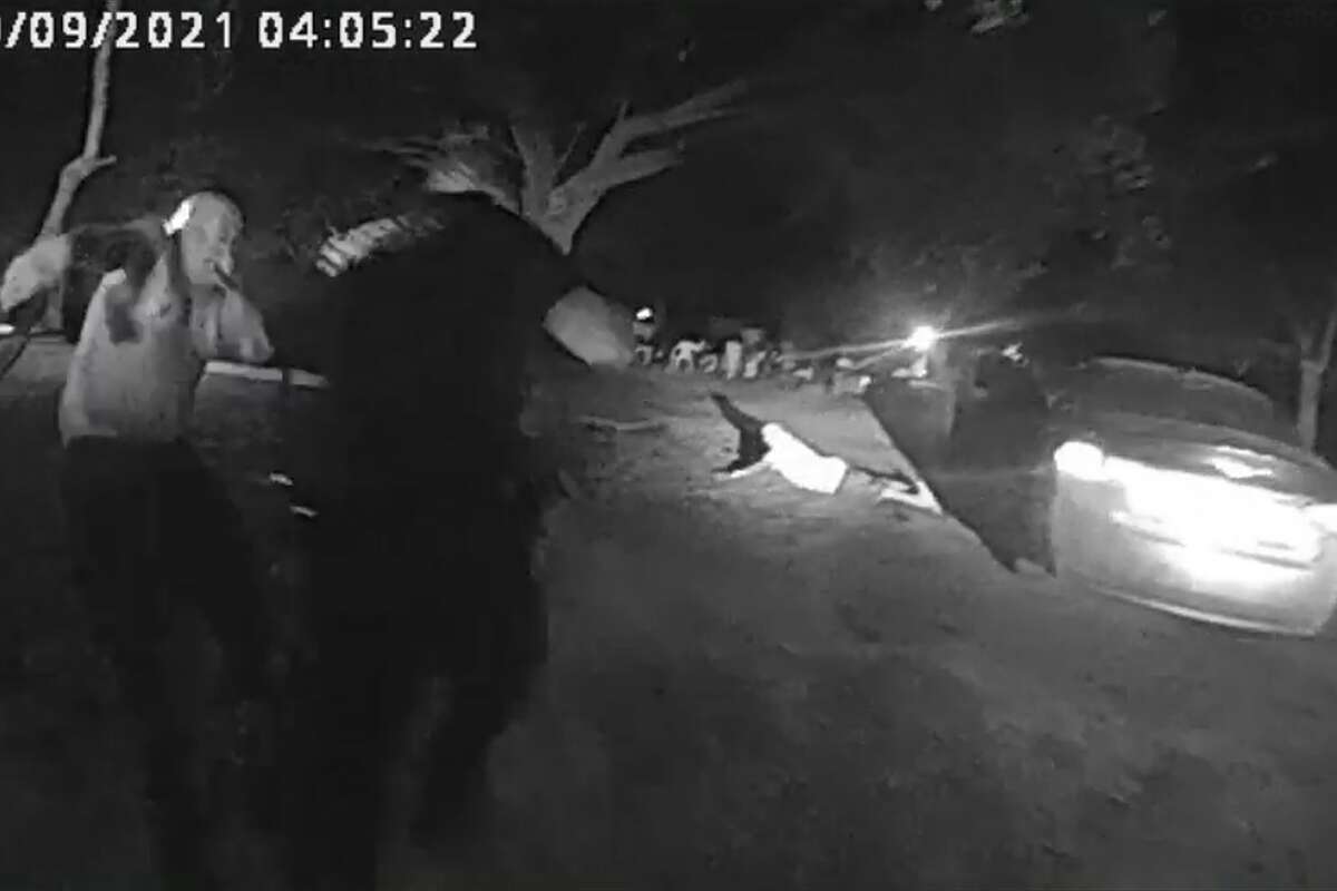 Rodolpho Vela, left, is knocked down by Harris County Sheriff's Office deputy Anthony Lewis, in this screen shot from a body camera video. Lewis and other deputies are being sued by Vela over their alleged use of excessive force.
