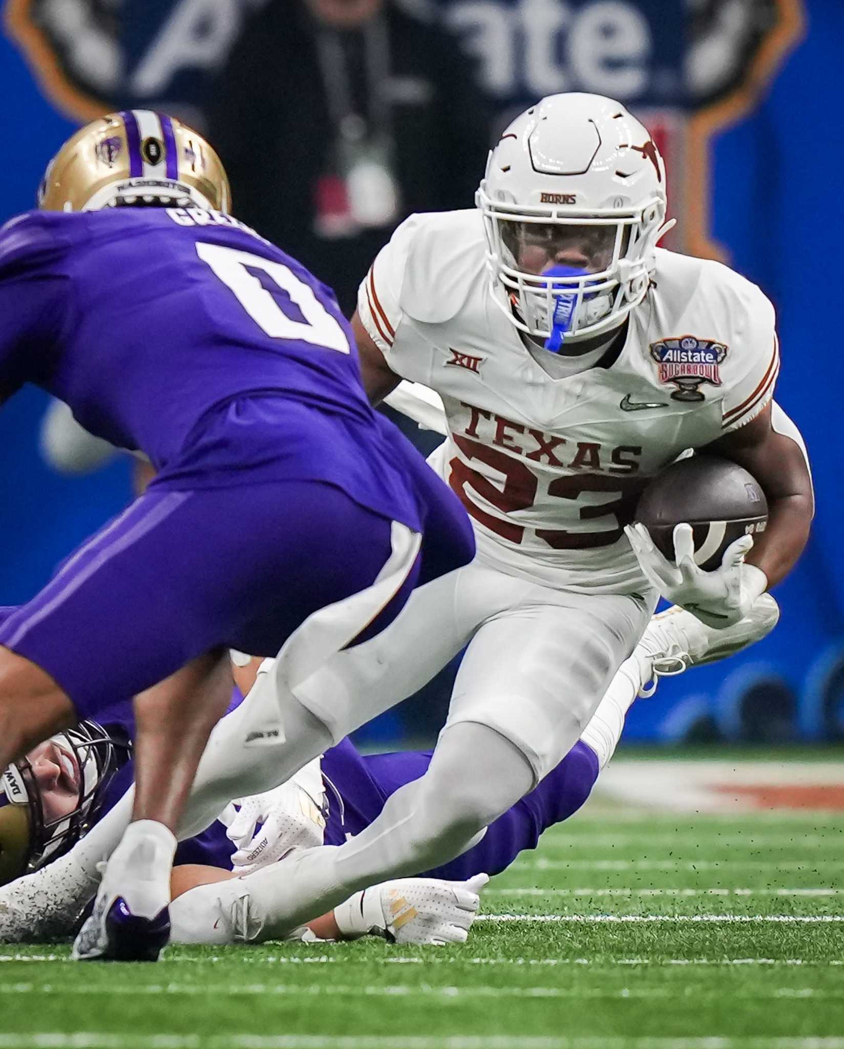 Fotball Springing Texas football's running game is springing forward, much to Steve ...