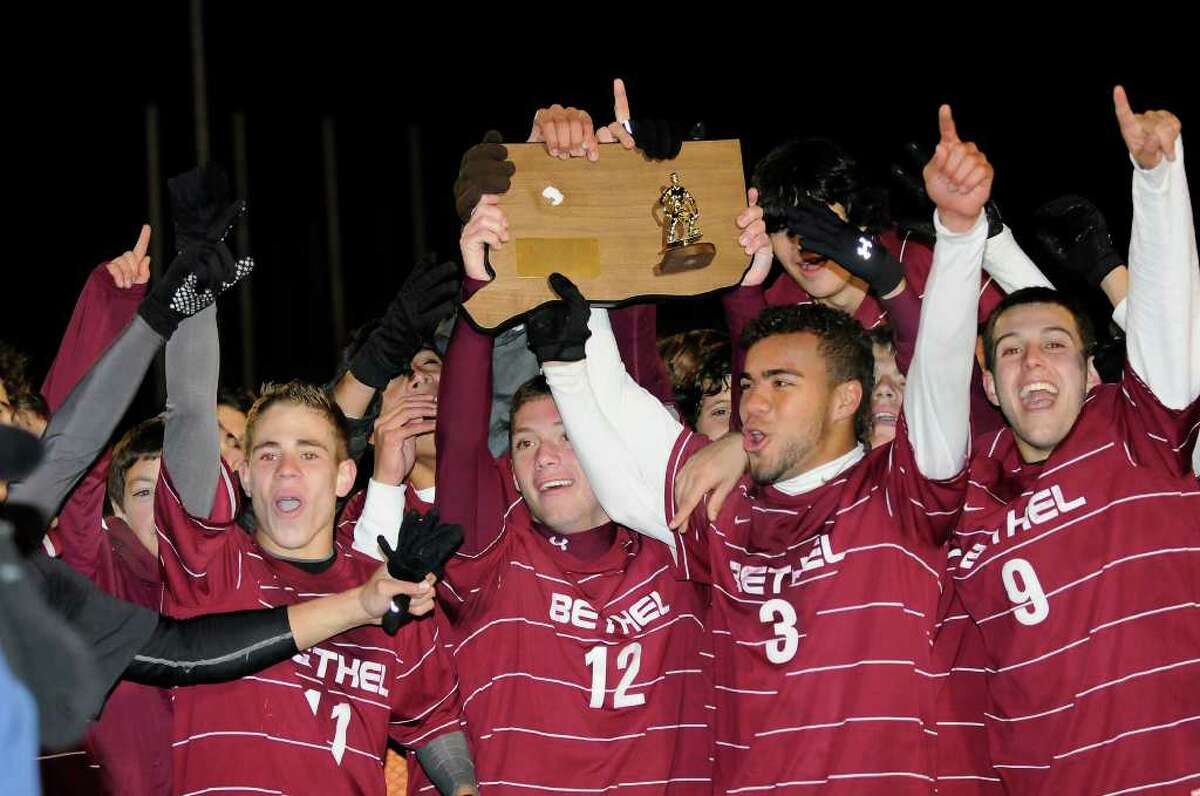 After 40 minutes of extra play leads to a one-one tie, Bethel High School shares the state championship with Montville High School for the Class M Finals boys soccer state tournament at Ken Strong Stadium at West Haven High School in West Haven, CT on Friday November 19, 2010.