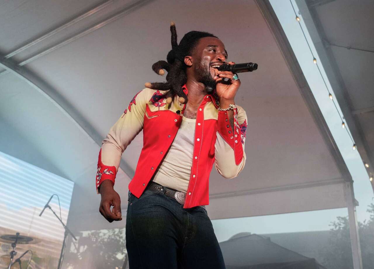 Country artist Shaboozey performs in front of the Moody Center at the Ford Fan Fest ahead of the opening night of Gambler Days in Austin, Aug. 23, 2024.