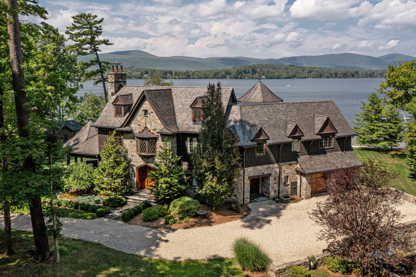 CT house on the Twin Lakes with stone tower listed