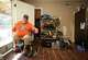 Carlos Vallejo Jr. needs many assistive devices as well as new floors for his home.