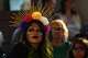 Attendee Laura Cavazos, in Dia de los Muertos makeup, listens to speakers during the Alma y Corazon Ceremony in the Oakwood Cemetery chapel on Thursday, Nov. 2, 2023 in Austin.