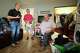CG&S Design-Build production manager Nathan Morris, left, and project manager Danny Scott talk to Carlos Vallejo Jr., who lost an arm and a leg in a 2018 boating accident, about remodeling his house in East Austin Monday December 16, 2024. CG&S Design-Build is remodeling his house as part of the Statesman Season For Caring campaign.