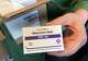 Nurse practitioner Debra Lynch holds a box of mifepristone, the first drug used in a medication abortion regimen. Practicing under Delaware's shield law, Lynch prescribes the pills via telehealth, largely to patients in abortion-restricted states like Texas.