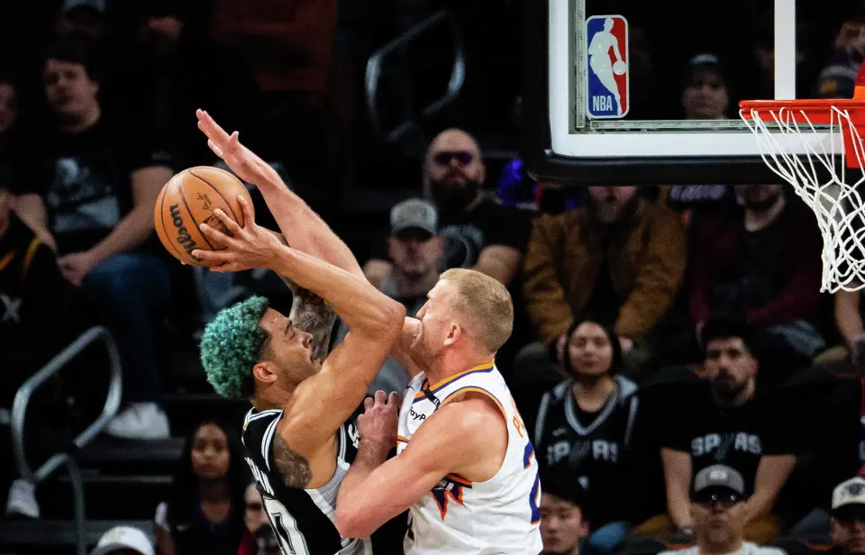 Phoenix Suns center Mason Plumlee (22) blocks an attempt from San Antonio Spurs forward Jeremy Sochan (10) in the first half as a the Spurs take on the Suns in the first of two I-35 Series games at the Moody Center in Austin, Feb. 20, 2025.