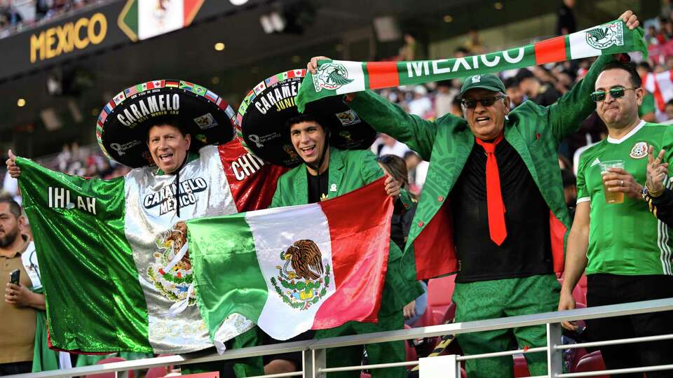 Fans cheer before Mexico plays Honduras for the CONCACAF Gold Cup semifinal soccer match Wednesday, July 2, 2025, in Santa Clara, Calif. (AP Photo/Eakin Howard)