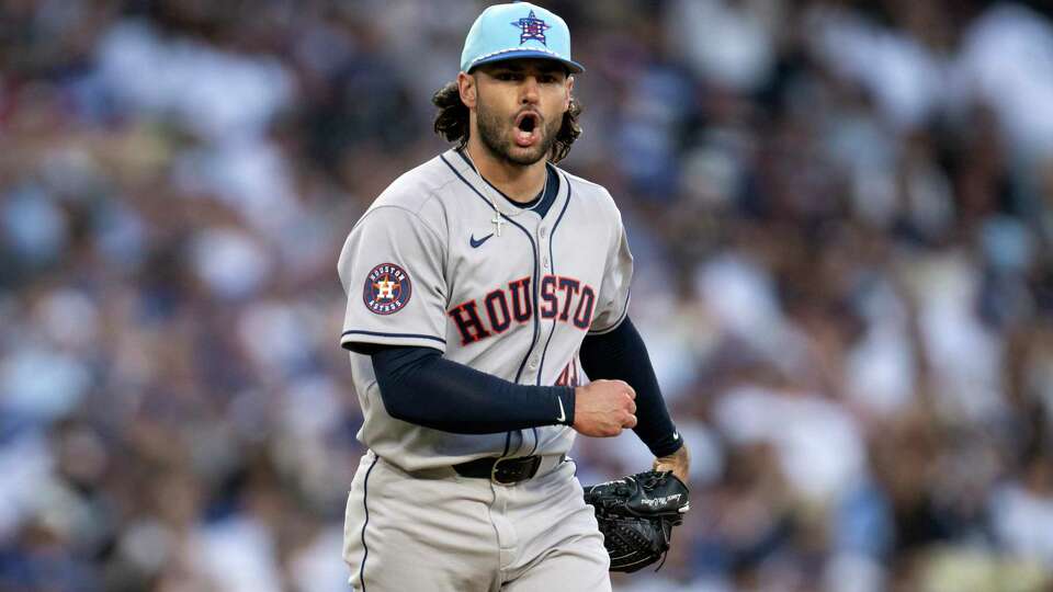 Houston Astros starting pitcher Lance McCullers Jr. reacts after striking out Los Angeles Dodgers' Mookie Betts during the fifth inning of a baseball game in Los Angeles, Friday, July 4, 2025. (AP Photo/Kyusung Gong)