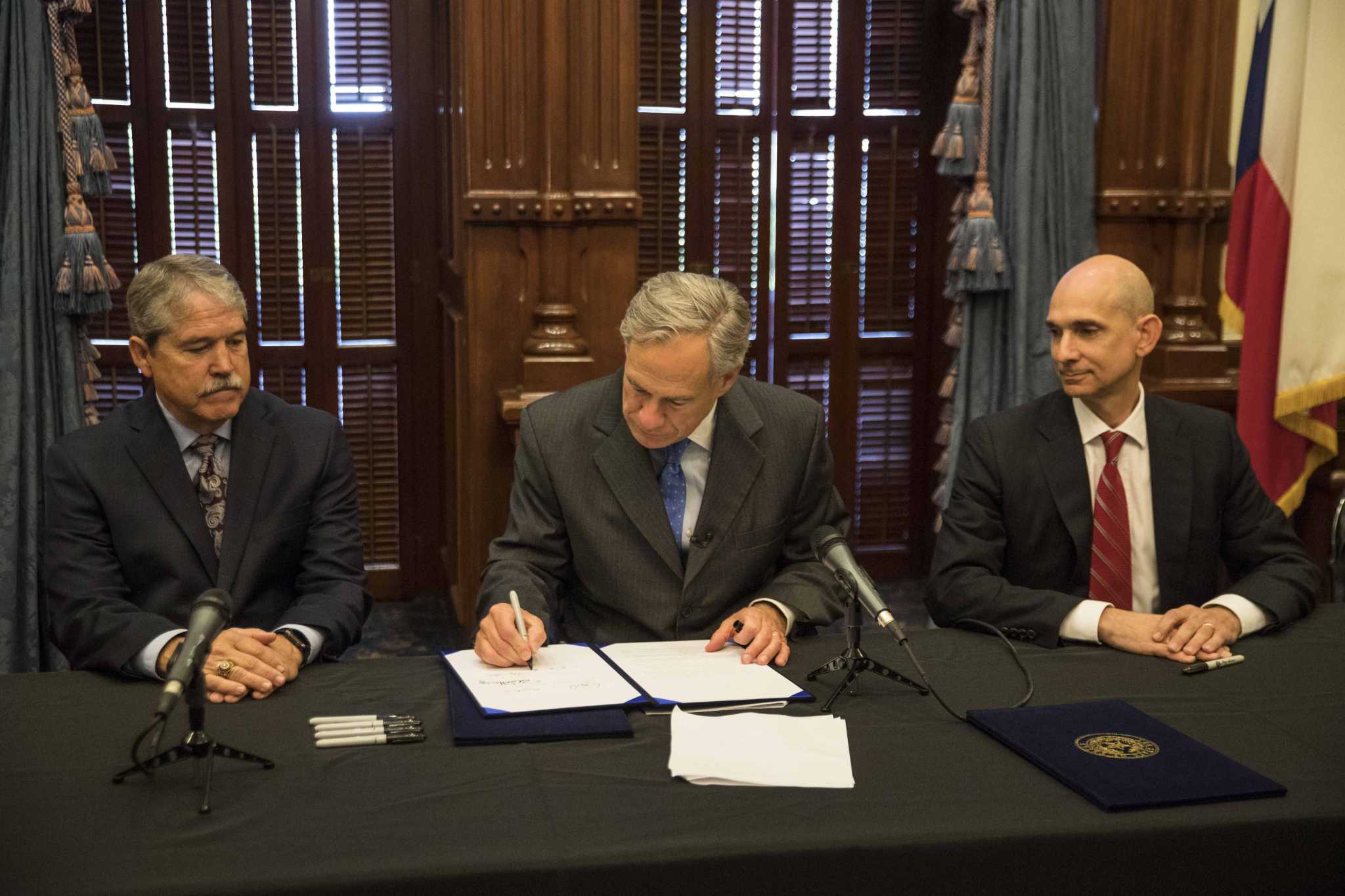 Abbott signs into law school safety bills