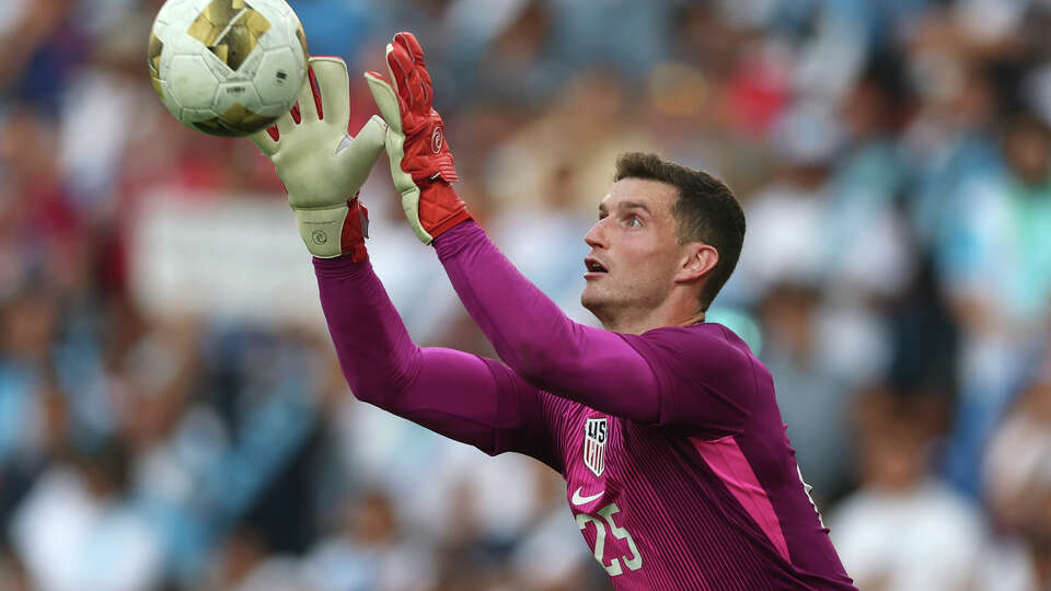 Matthew Freese makes a save against Guatemala in the semifinals that helped the U.S. reach the title game against Mexico.