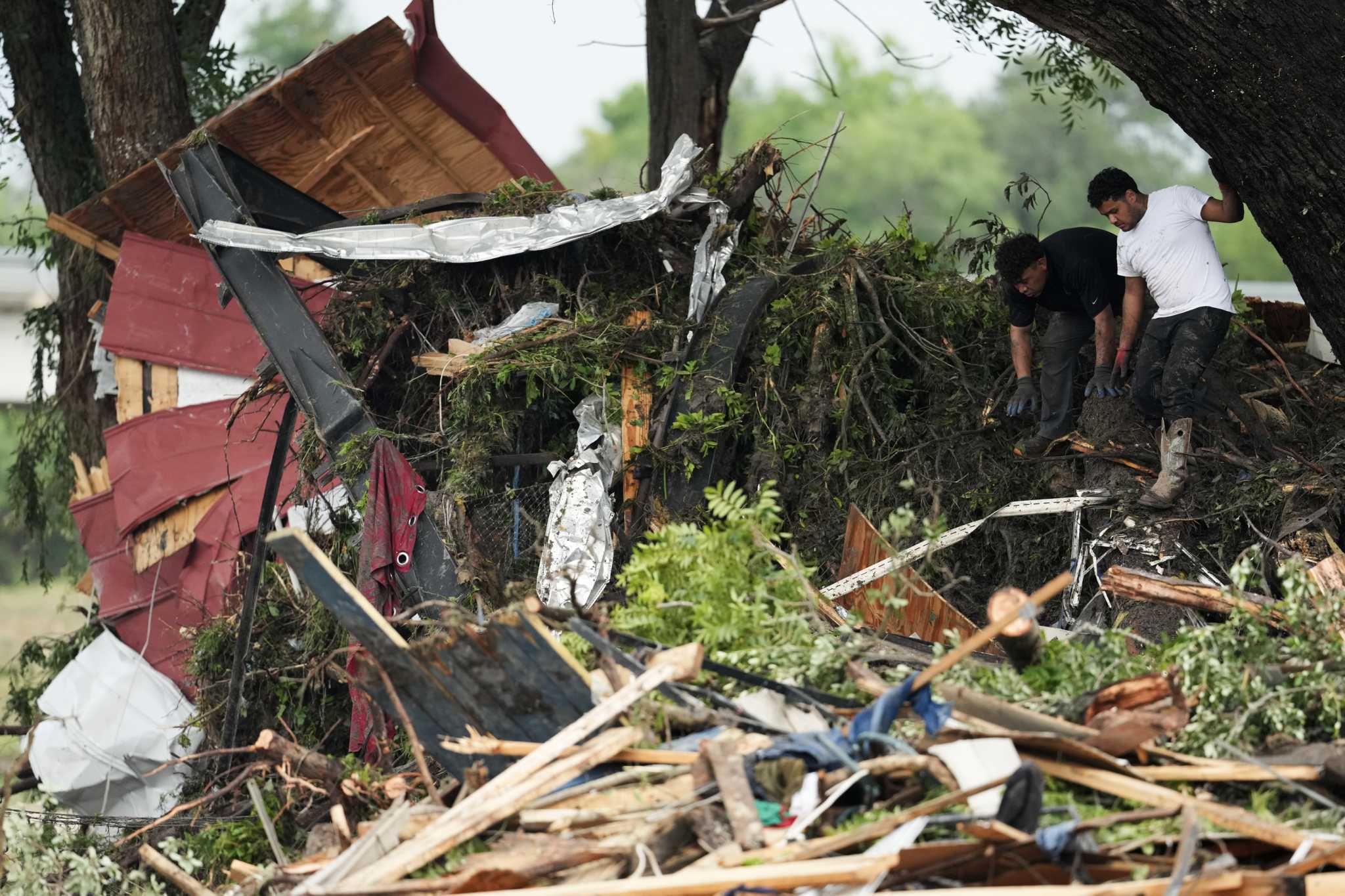 Texas sisters found dead with 'hands locked together' after floods