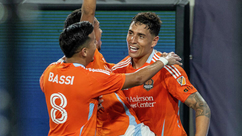 Houston Dynamo forward Ezequiel Ponce (10) celebrates his goal with midfielder Amine Bassi (8) and midfielder Erik Dueñas, in extra time of a MLS soccer game between Houston Dynamo and San Diego FC, Saturday, July 5, 2025, at Snapdragon Stadium in San Diego, California. (Photo by Tony Ding/Icon Sportswire via Getty Images)