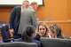 Angelica Cogliano, middle, attorney for Tia Jones, confers with her team at a hearing about a protective order against Kansas City Chiefs player Xavier Worthy at the Williamson County Justice Center in Georgetown Tuesday April 1, 2025.