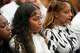 Tia Jones, middle, waits for hearing about a protective order against Kansas City Chiefs player Xavier Worthy, not in attendance, at the Williamson County Justice Center in Georgetown Tuesday April 1, 2025.