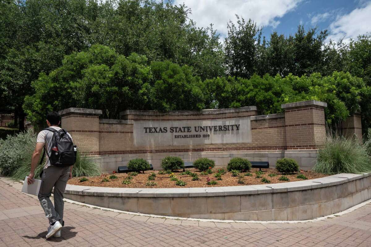 A student walks on campus at Texas State University in San Marcos Monday, June 30, 2025. The university announced they joined the Pac-12 conference Monday.