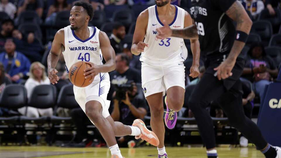 Golden State Warriors’ LJ Cryer and Isaiah Mobley against San Antonio Spurs during Spurs’ 90-88 win in California Classic game at Chase Center in San Francisco on Sunday, July 6, 2025.