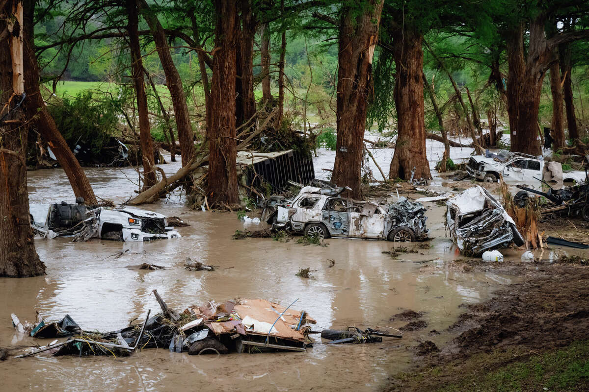 Wrecked vehicles and trailers along the Guadalupe River in Kerrville, Texas on Sunday, July 6, 2025. 