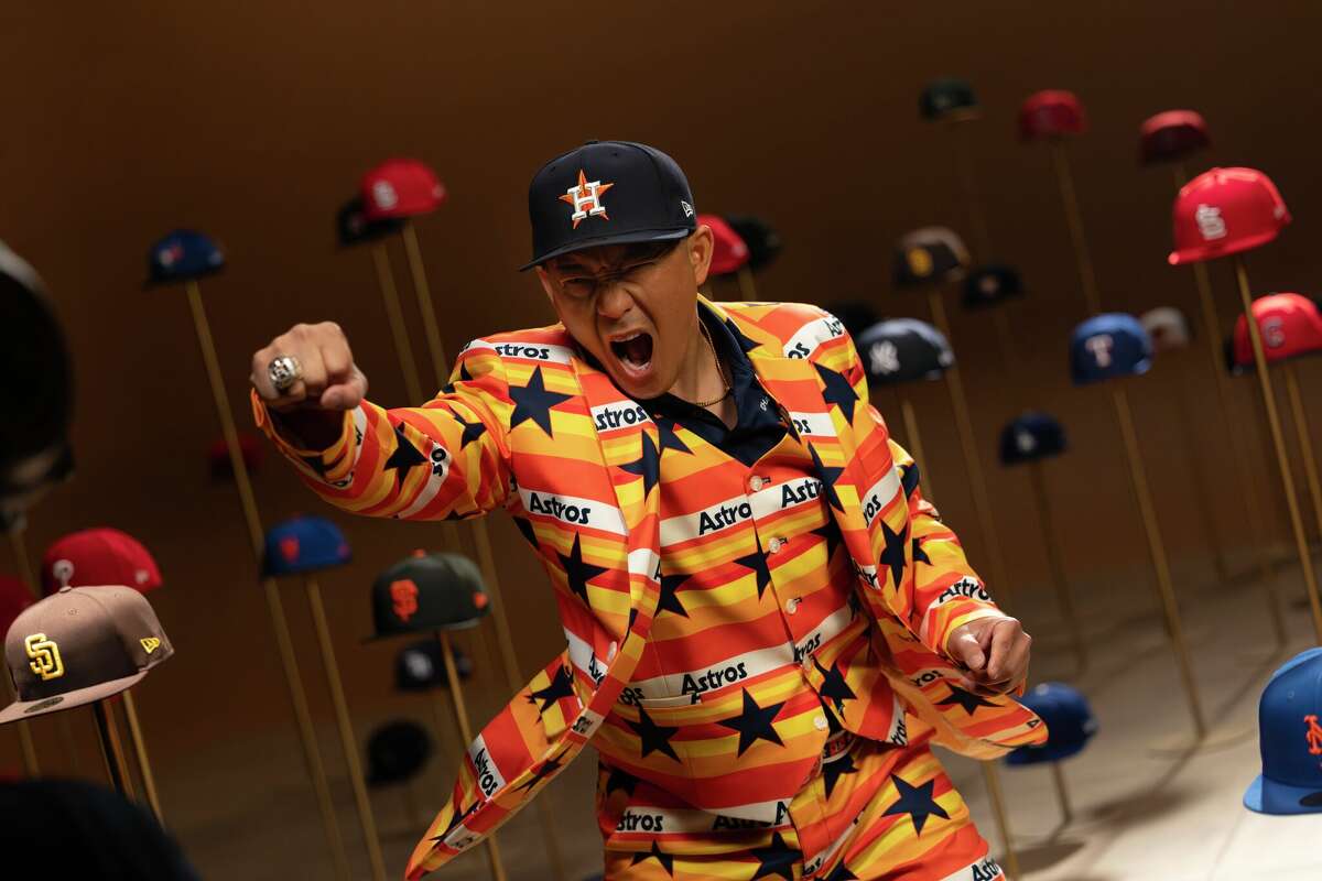 Houston Astros superfan Nguyen Le, who attends all of the team's playoff games both at home and on the road, appears in a New Era Cap commercial that was released July 7, 2025.