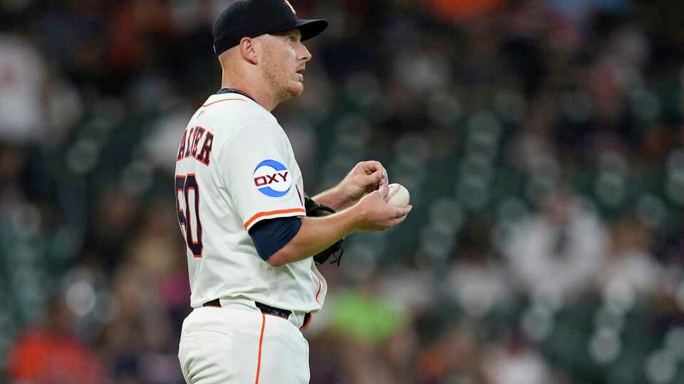 Houston Astros starting pitcher Brandon Walter looks the outfield after giving up a home run to Cleveland Guardians' José Ramírez during the first inning of a baseball game Wednesday, July 9, 2025, in Houston. (AP Photo/David J. Phillip)