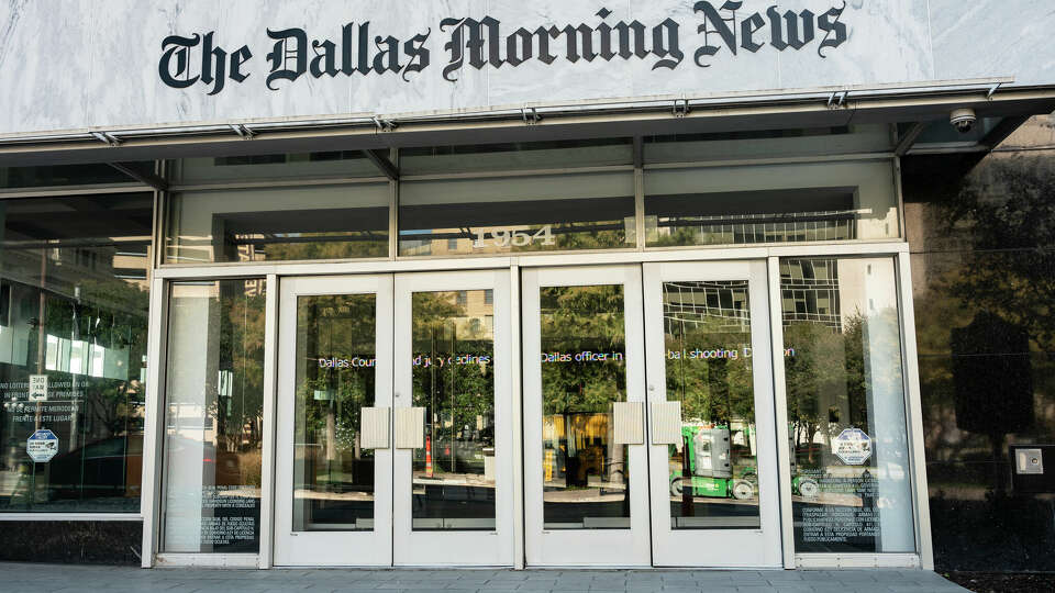 Dallas, Texas, USA - November 13, 2021: Exterior front entrance doors of the Dallas Morning News newspaper building in the downtown core Texas USA