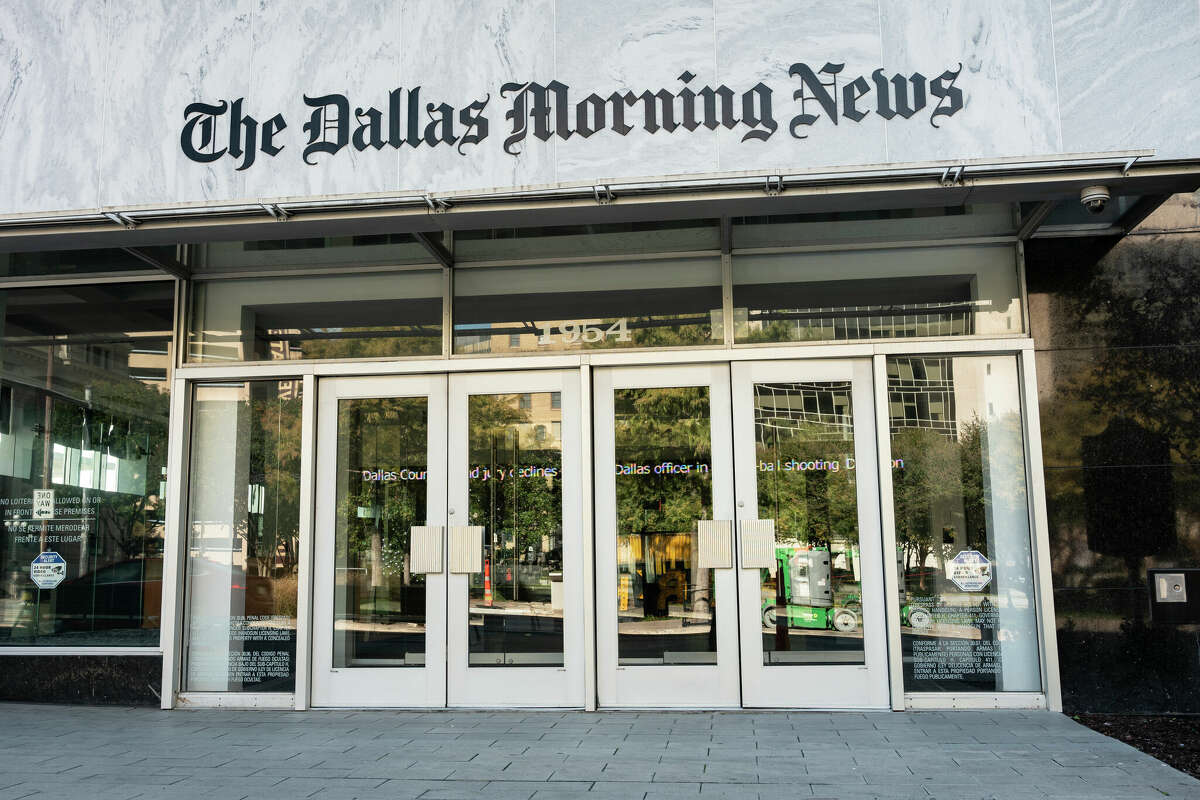 Dallas, Texas, USA - November 13, 2021: Exterior front entrance doors of the Dallas Morning News newspaper building in the downtown core Texas USA
