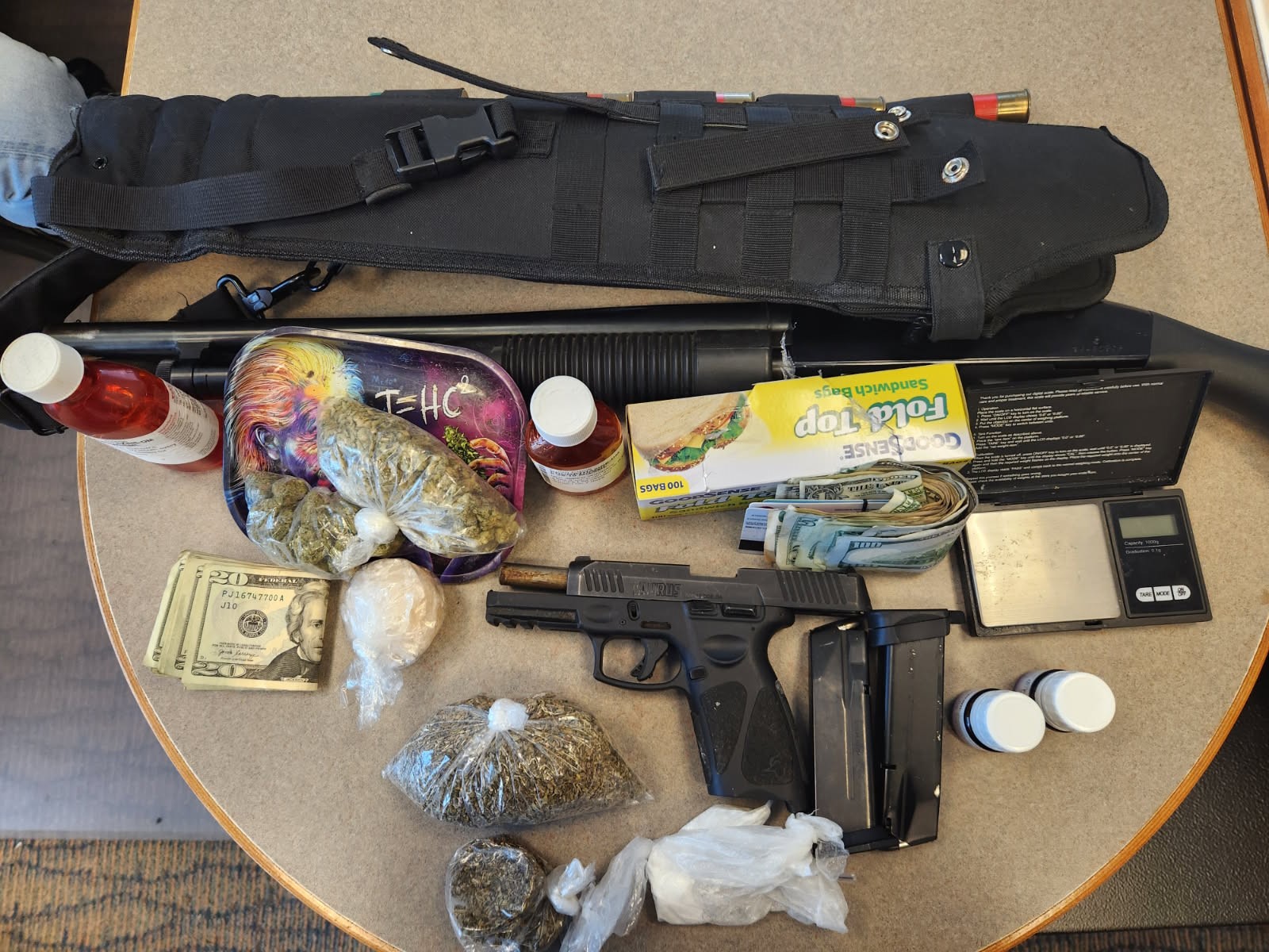 Orange police arrest two after drugs, guns found in home with child