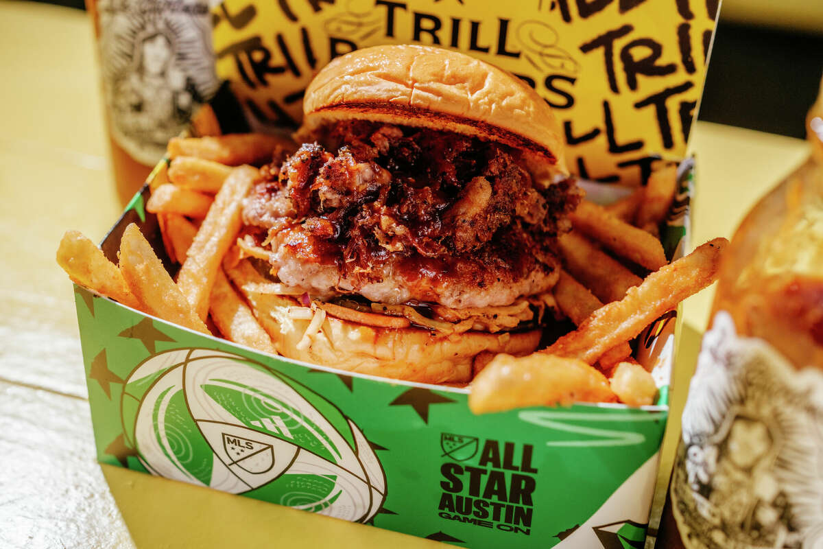 The Game On Burger includes a Trill Burgers pork belly patty and La Barbecue pulled pork, and will be available throughout the week in Austin, Texas.