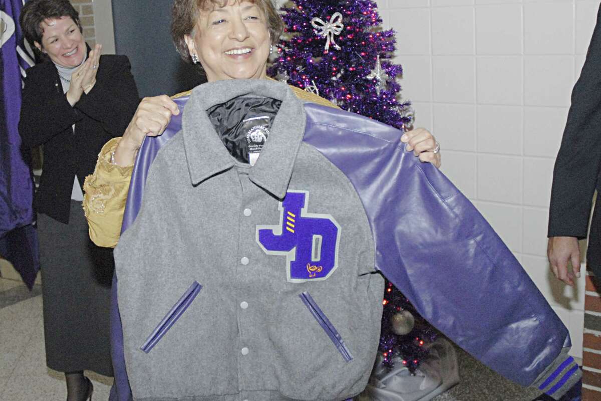 Emily Cole, holds a Jeff Davis letter jacket, presented to her after the naming the new wing of Jefferson Davis High School for her (Cole), on Thursday, November 15, 2007. (Neighborhood News/Tim Johnson)