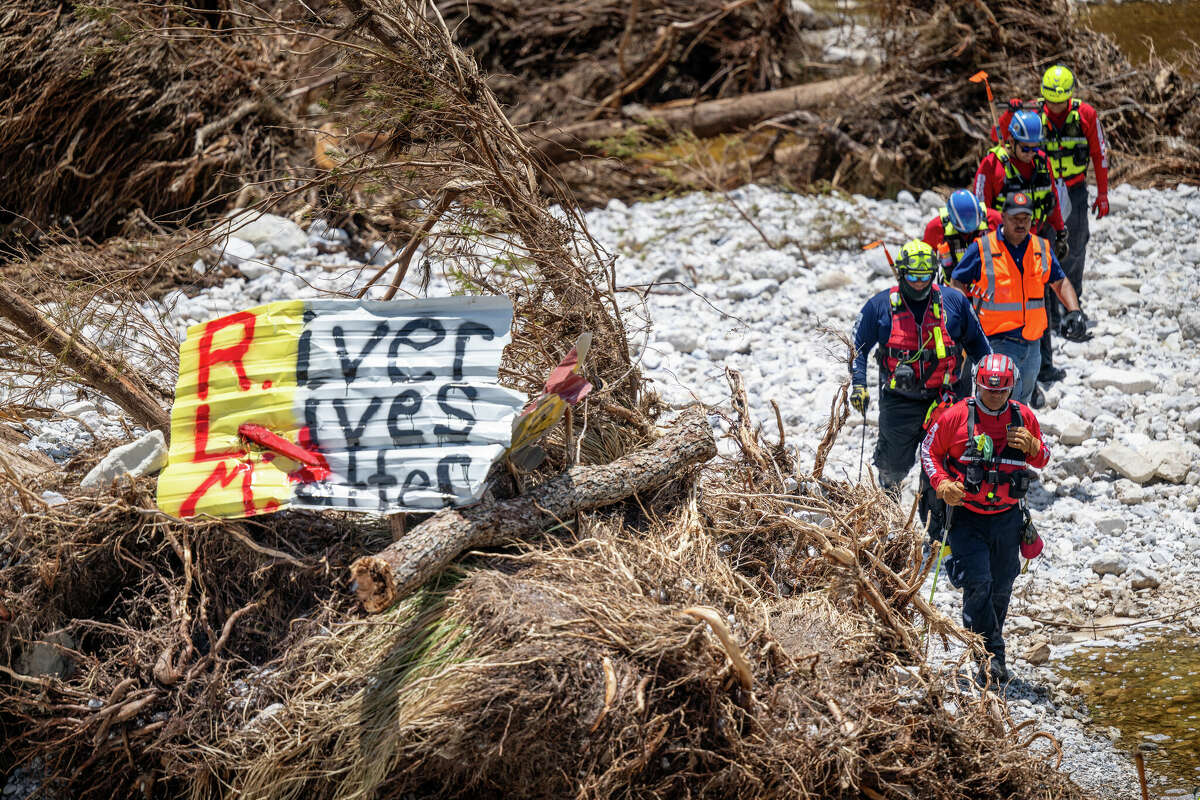 Fire Station Acuna Mexico perform search and rescue operations in the Guadalupe River near Camp Mystic on July 10, 2025 in Hunt, Texas. 