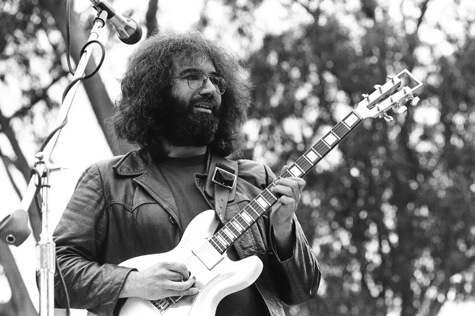 Jerry Garcia of the Grateful Dead performs live at Golden Gate Park in 1975 in San Francisco.